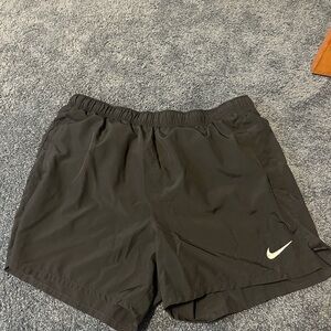 Men’s black Nike running shorts
